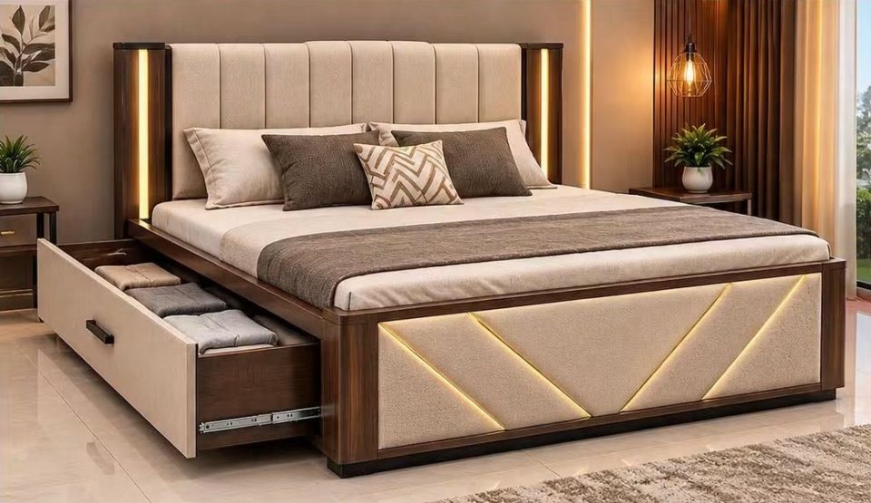 Upholstered storage bed with lit headboard pillars, a geometric footboard and a pull-out drawer